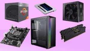 Rozłożone komponenty taniego PC do gier na stole z narzędziami montażowymi