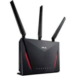 Nowoczesny router gamingowy z RGB podświetleniem i antenami na biurku gracza